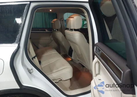 2014 Volkswagen Touareg 3.6L Executive z USA, uszkodzony, nr VIN WVGEF9BP7ED010507